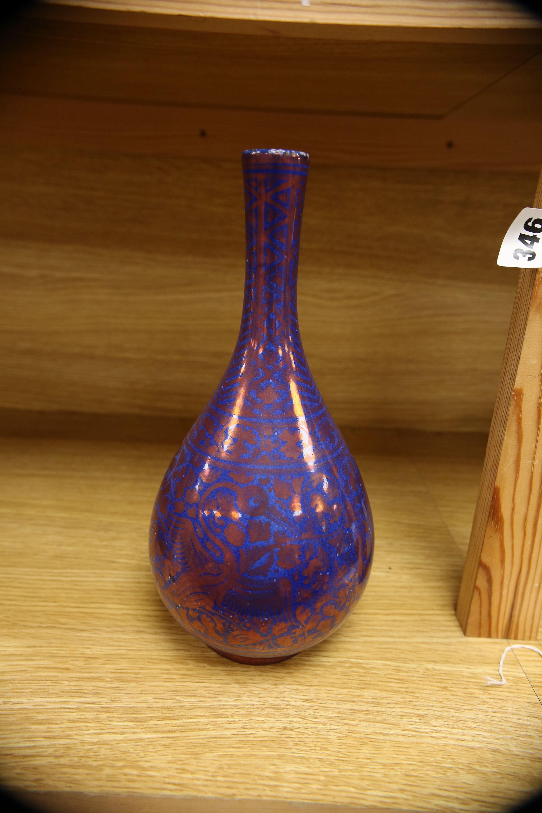 A Gallo, Italy copper lustre bottle vase, copy of a Safavid design, 27cm. Condition - good